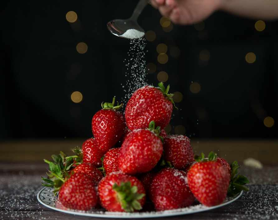Food photography: Overhead view of plate of strawberries